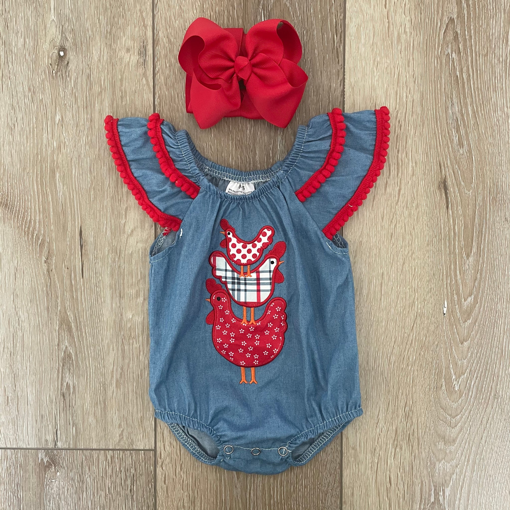 DENIM CHICKEN STACKED FLUTTER SLEEVE ROMPER